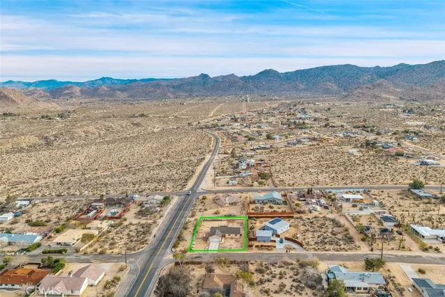 a view of a city with mountain