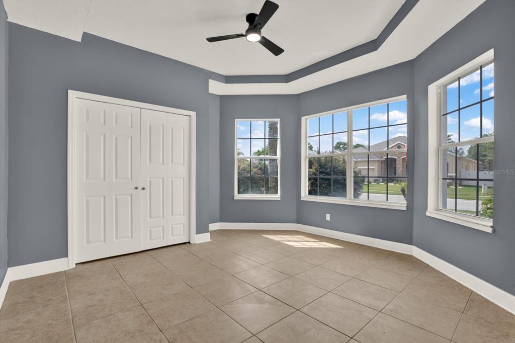 13397 Hunters Point Street Spring Hill, FL 34609 - Photo 26 of 38 a view of an empty room with a window