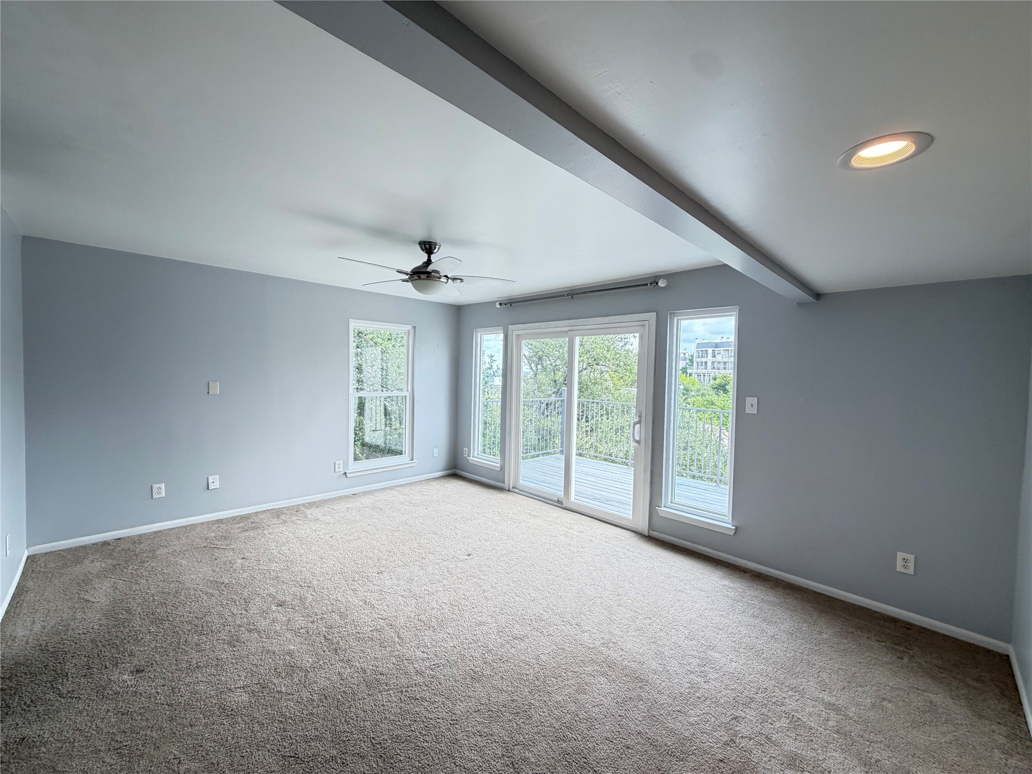 2918 Ranch Road 620 North, Unit C120 Austin, TX 78734 - Photo 21 of 34 Another view of the primary bedroom with sliding door that leads to the outdoor private deck.