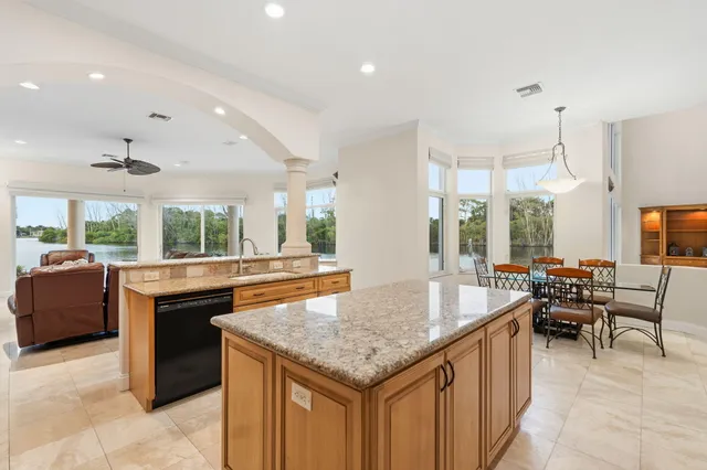 a bedroom with a large bed and a dresser