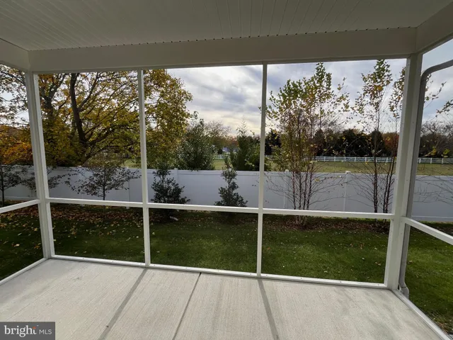 a bathroom with a shower and toilet