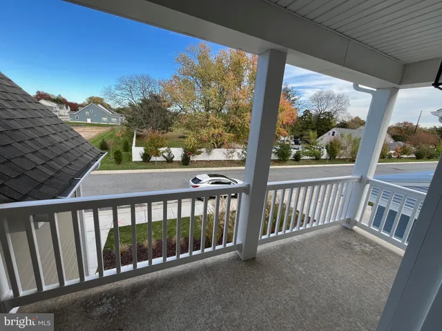 a view of a balcony with an outdoor space