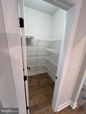 a bathroom with a glass door shower