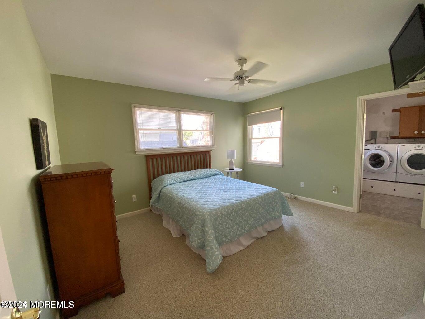 564 Perch Avenue Manasquan, NJ 08736 - Photo 7 of 15 a bedroom with a bed and a television