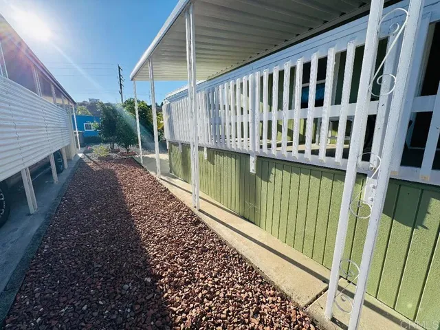 a view of a balcony with staircase