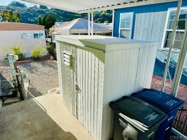 a balcony view with couches in a patio