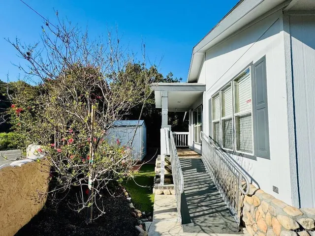 a view of house with outdoor space