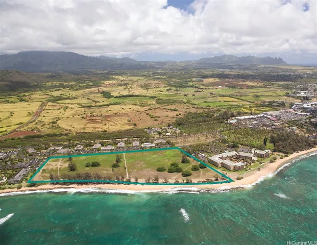 a view of a city with an ocean beach