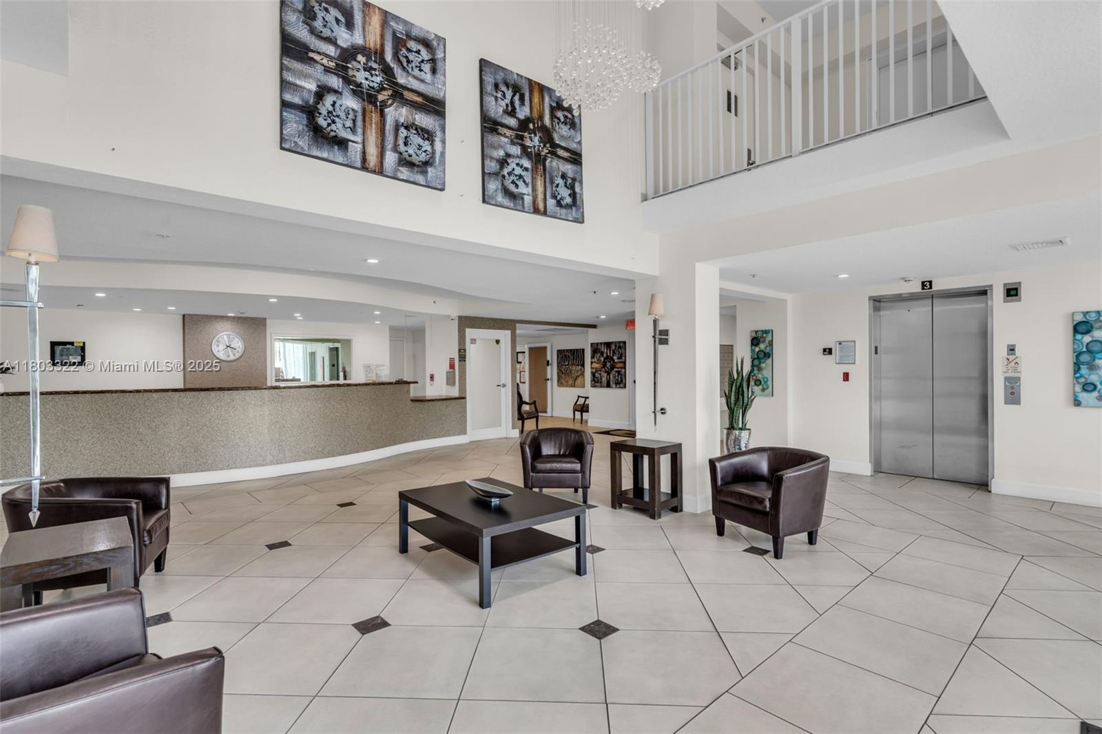 18100 North Bay Road, Unit 404 Sunny Isles Beach, FL 33160 - Photo 11 of 34 a living room with furniture