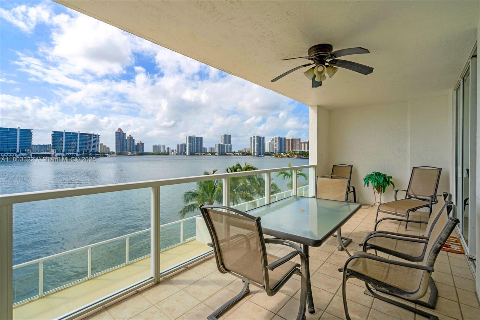 18100 North Bay Road, Unit 404 Sunny Isles Beach, FL 33160 - Photo 26 of 34 a view of a balcony with furniture
