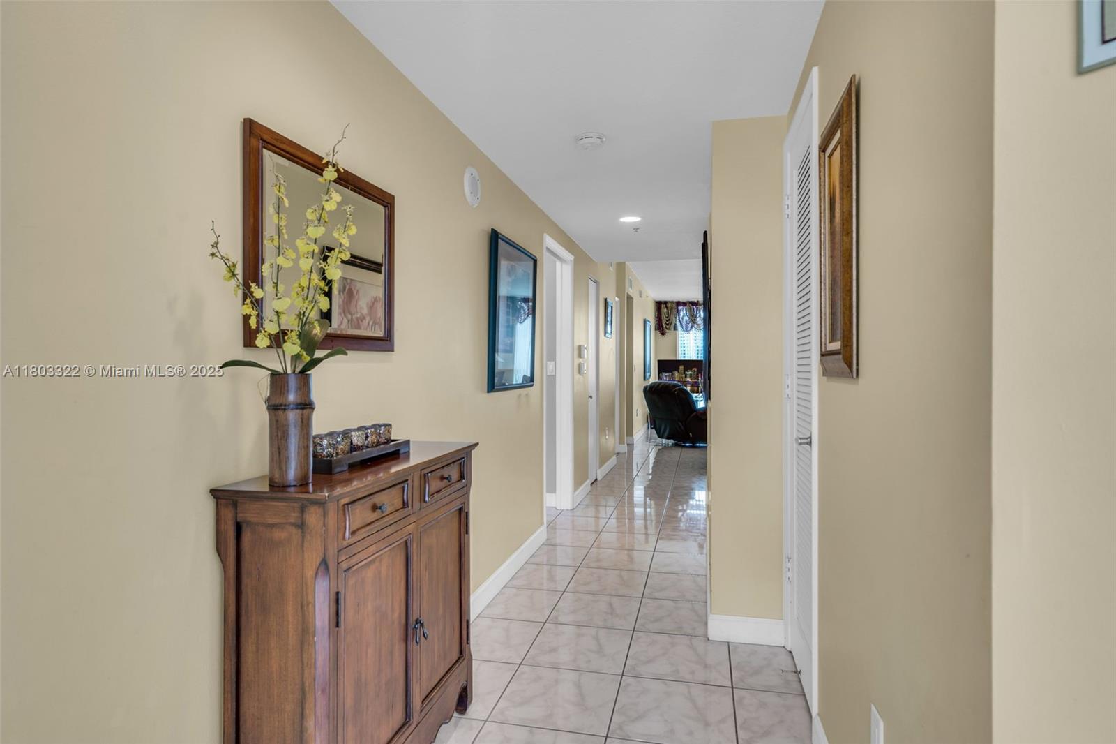 18100 North Bay Road, Unit 404 Sunny Isles Beach, FL 33160 - Photo 3 of 34 a bathroom with a sink and a mirror