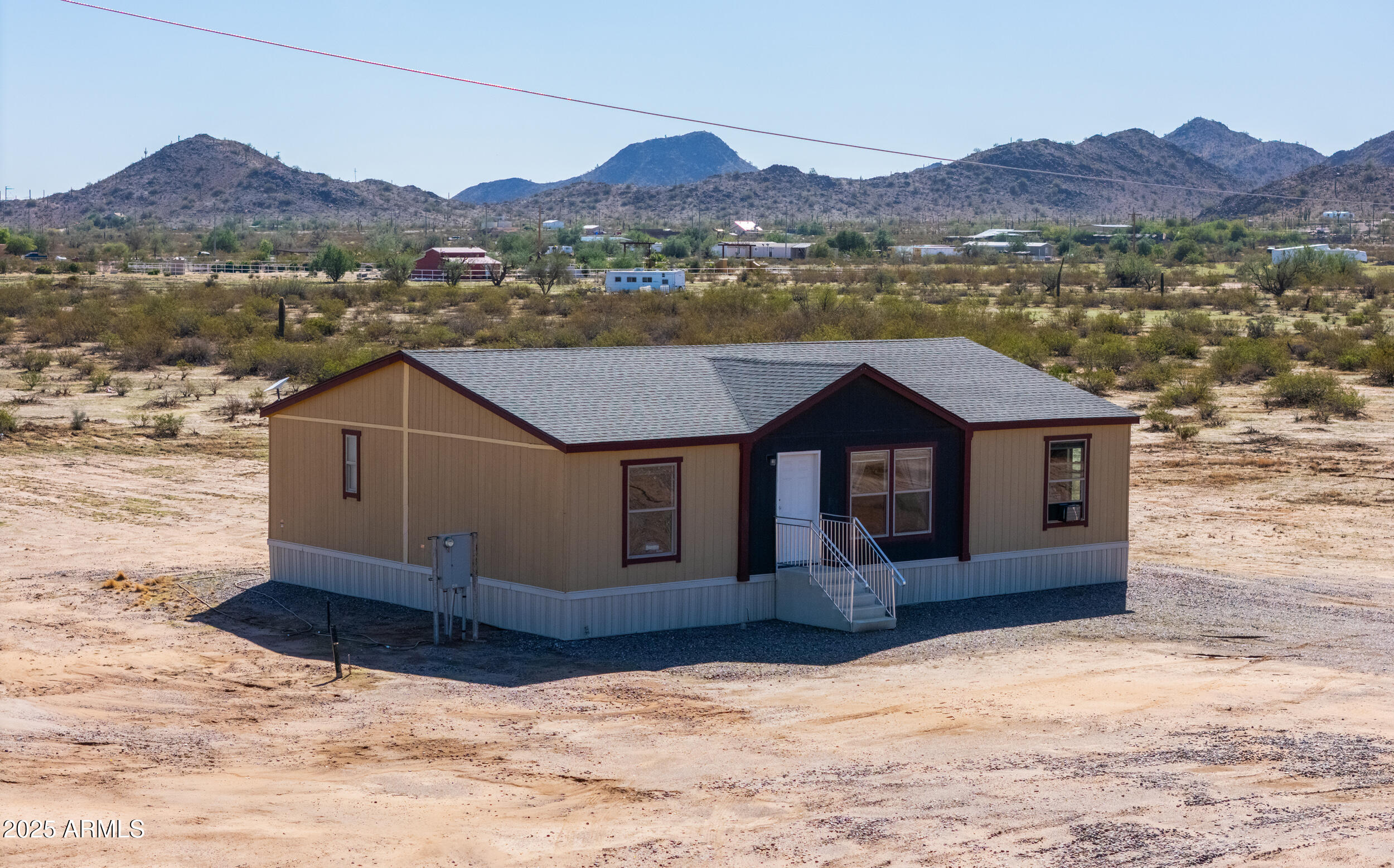 11091 North Garduno Road Maricopa, AZ 85139 - Photo 33 of 51 a view of a house with a yard