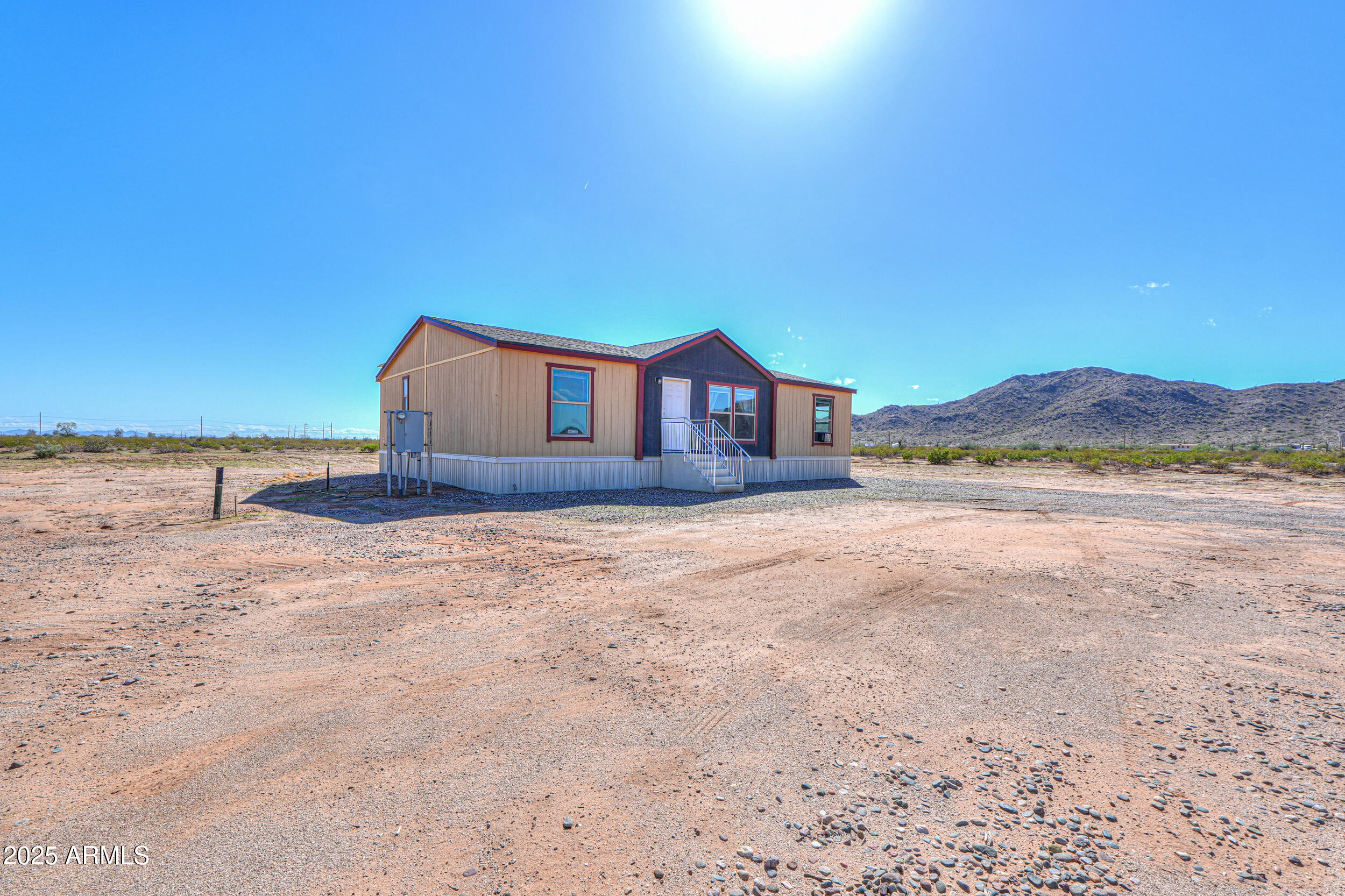 11091 North Garduno Road Maricopa, AZ 85139 - Photo 4 of 51 a view of a house with a yard