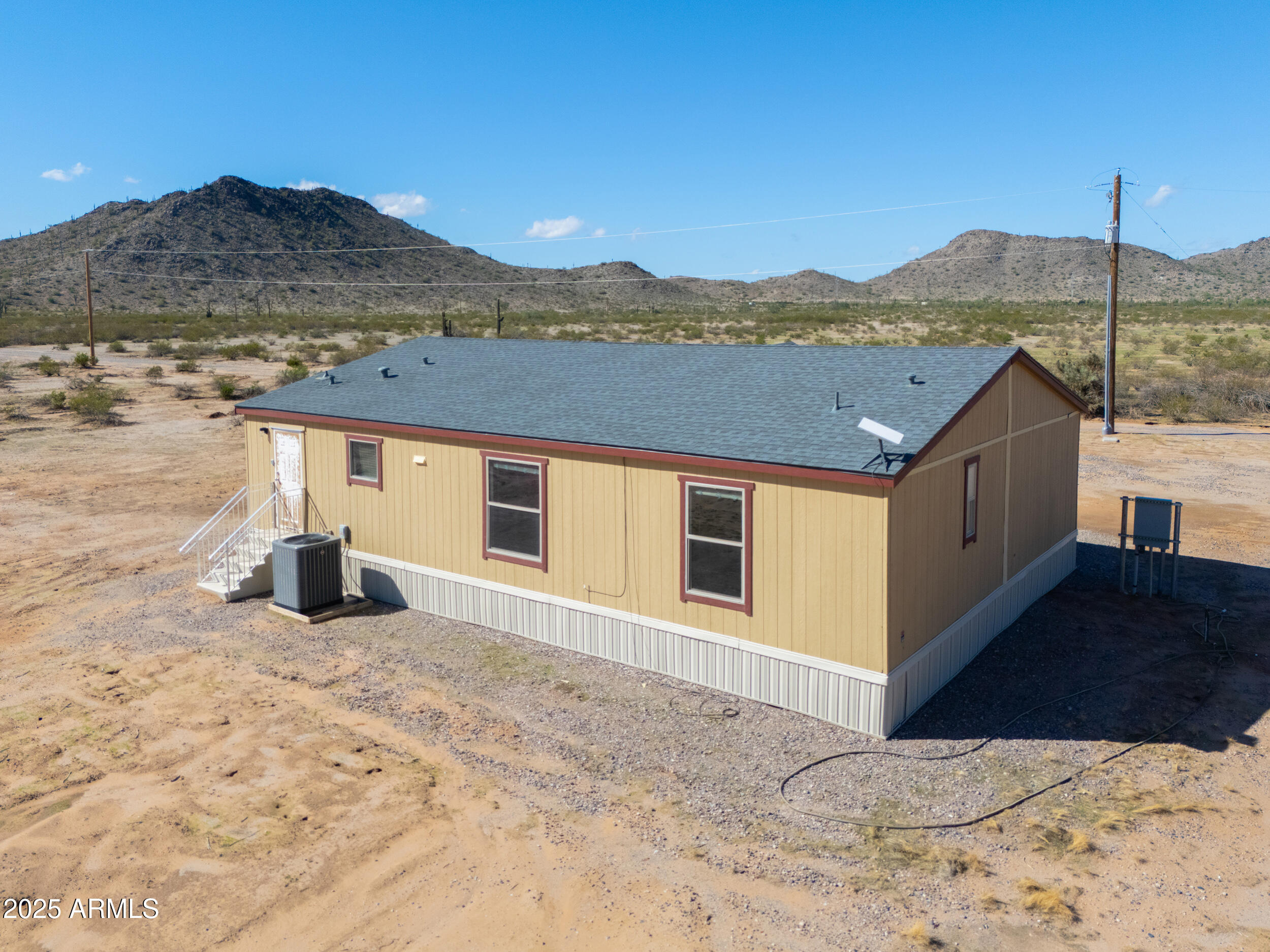 11091 North Garduno Road Maricopa, AZ 85139 - Photo 45 of 51 a view of a house with a mountain