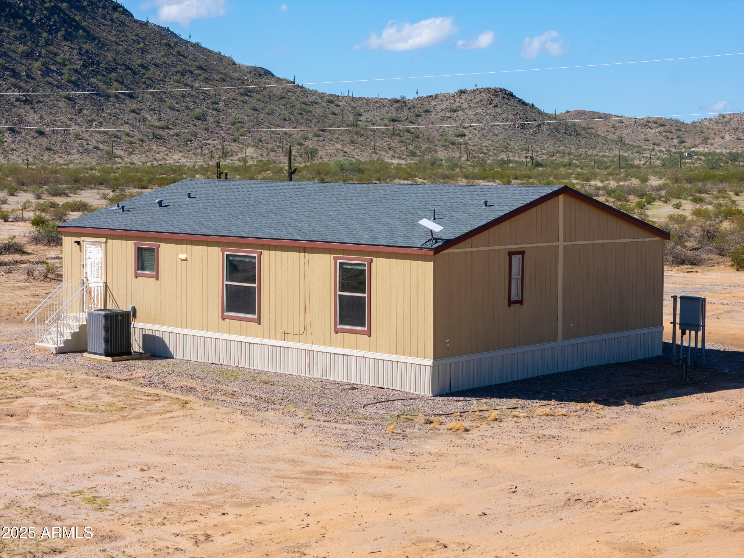 11091 North Garduno Road Maricopa, AZ 85139 - Photo 46 of 51 a front view of a house with a yard