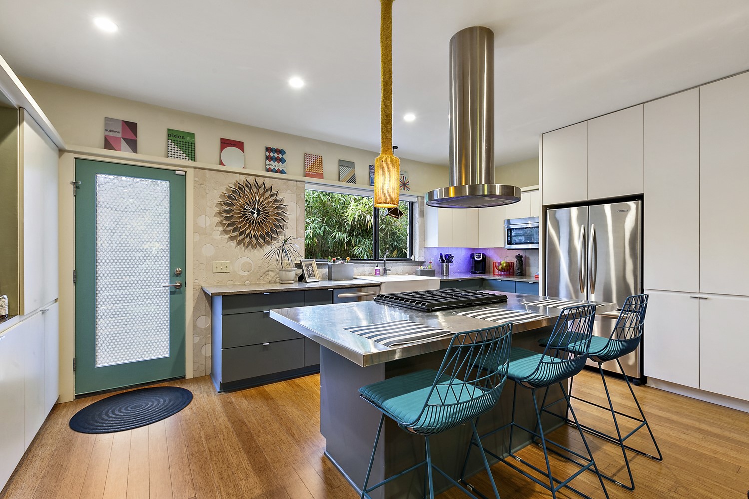 805 Cumberland Road, Unit B Austin, TX 78704 - Photo 11 of 37 The kitchen features stainless steel and concrete countertops along with a one-of-a-kind backsplash. Abundant built-ins and high-end appliances round out this spectacular kitchen.
