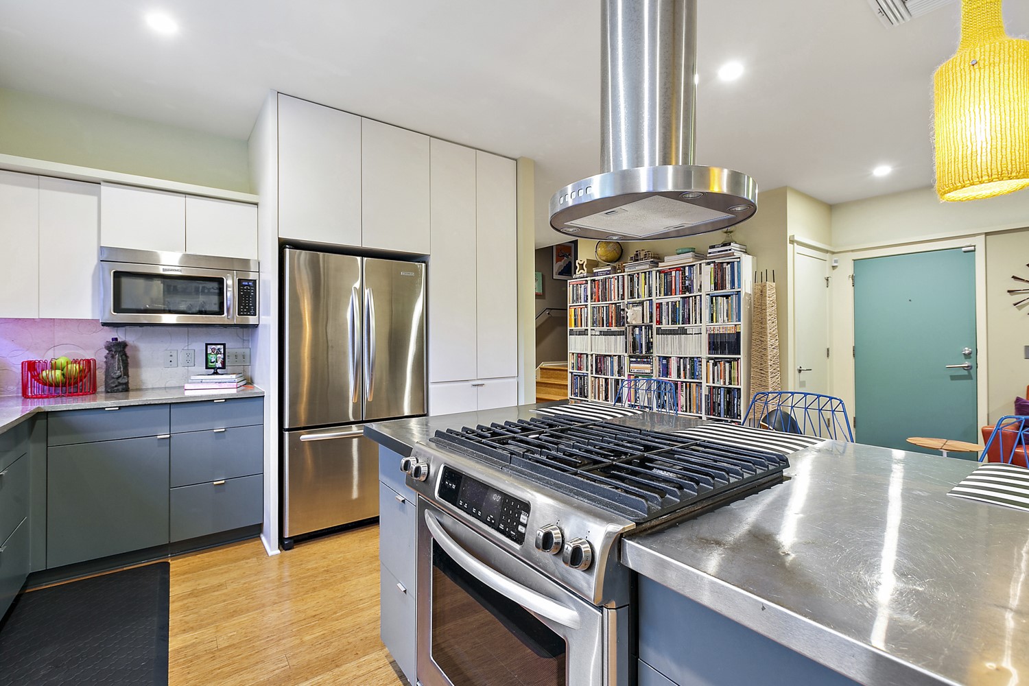 805 Cumberland Road, Unit B Austin, TX 78704 - Photo 16 of 37 Here is another view of the center island where you can see how open the flow is. Did I mention the designer light fixtures that can be found throughout yet? Also, fridge will stay with the property.