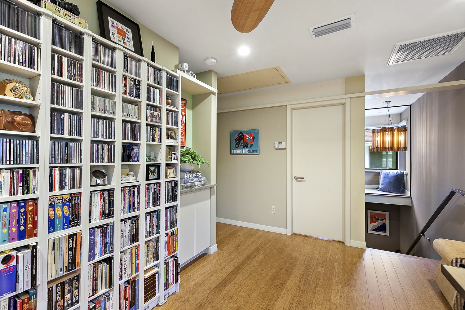 805 Cumberland Road, Unit B Austin, TX 78704 - Photo 20 of 37 This is another view of the upstairs loft area and you can see the stylish stairwell with the cool light fixture.