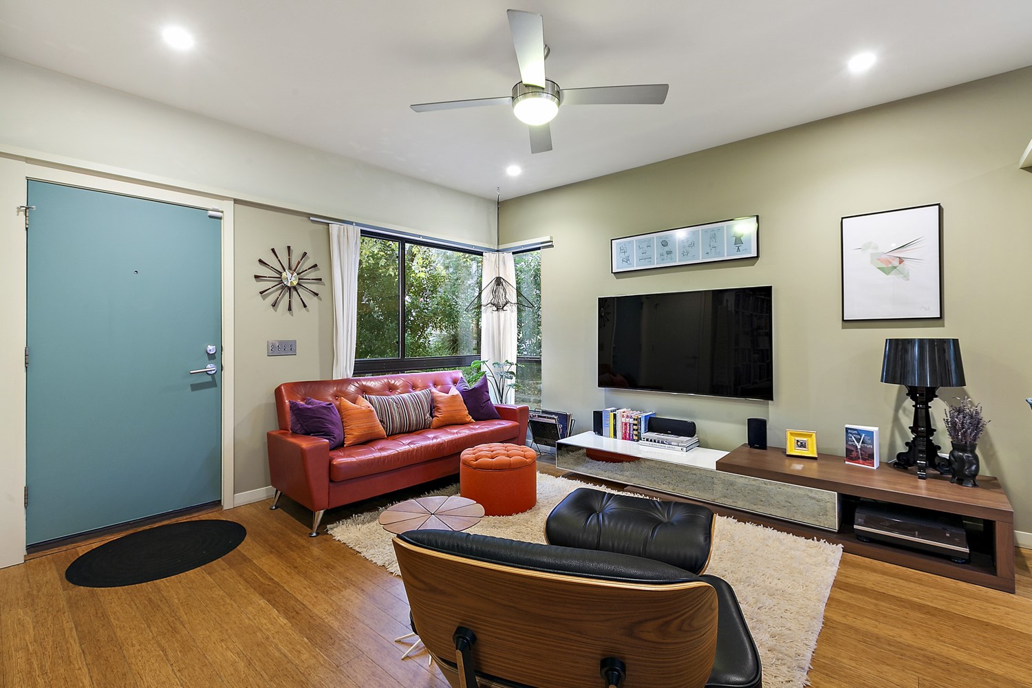 805 Cumberland Road, Unit B Austin, TX 78704 - Photo 5 of 37 Here is another view of the living room. The TV is no longer at the property but the TV wall mount is.