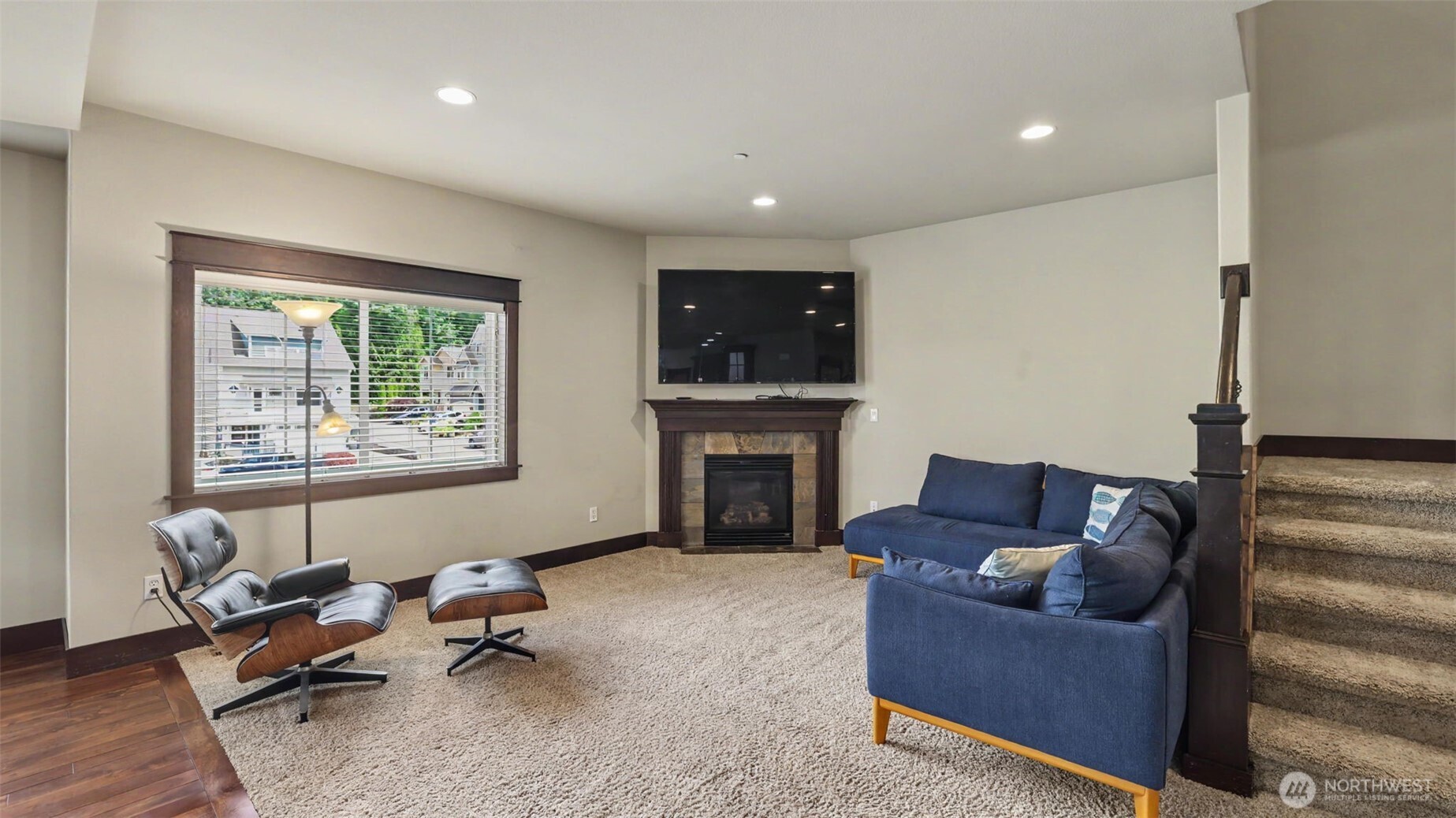 1357 Elma Place Northeast Renton, WA 98059 - Photo 13 of 40 a living room with furniture and a fireplace