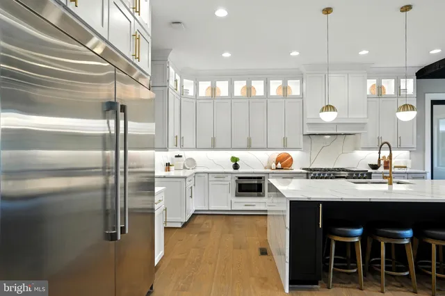 a bedroom with a bed and a night stand