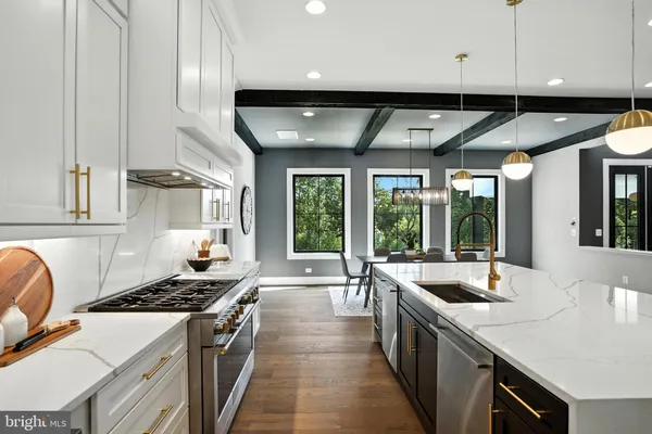 a bedroom with a large bed and a couch