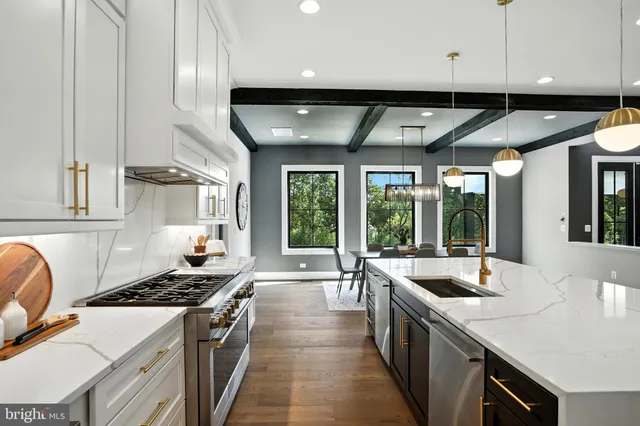 a bedroom with a large bed and a couch