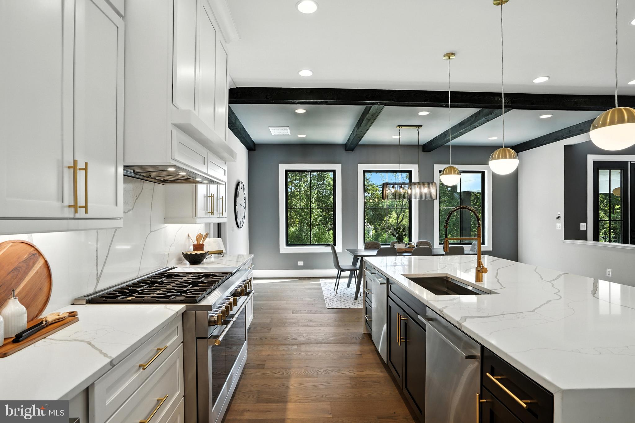 1321 Hunter Mill Road Vienna, VA 22182 - Photo 16 of 92 a kitchen with stainless steel appliances granite countertop a sink and a stove