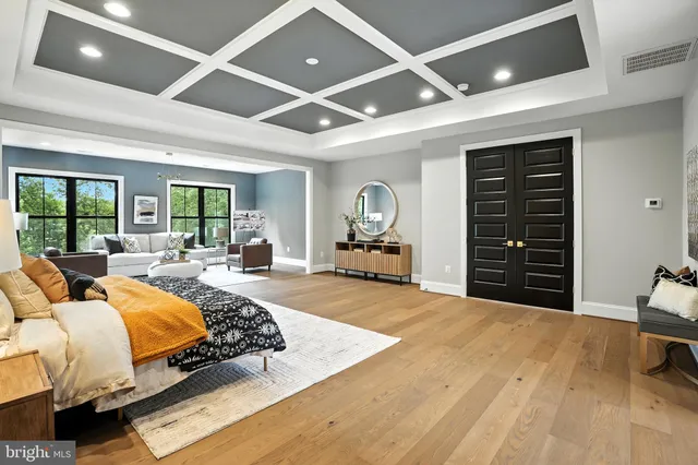 a view of entryway with wooden floor and stairs