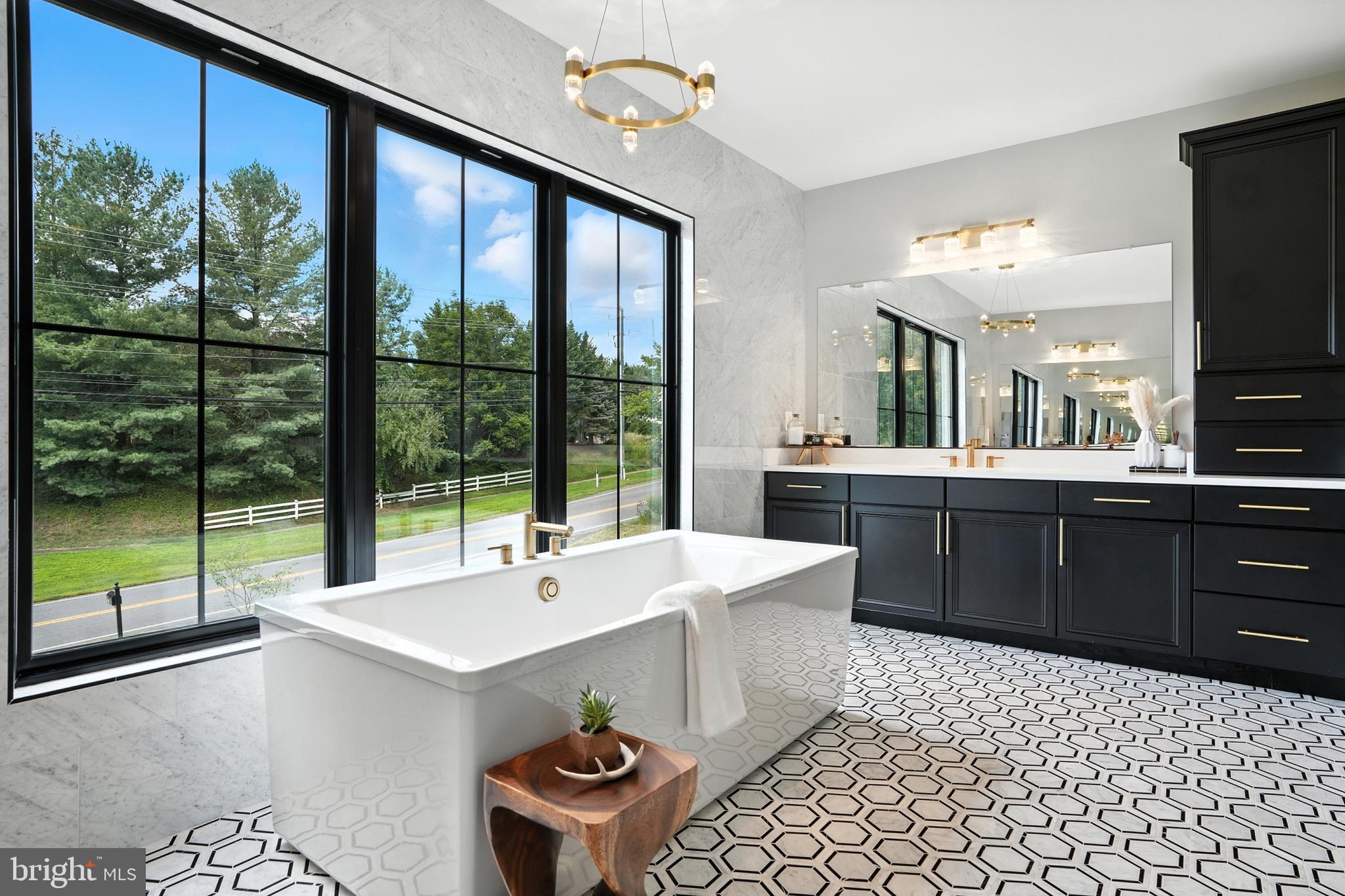 1321 Hunter Mill Road Vienna, VA 22182 - Photo 35 of 92 a room with a large window and kitchen view