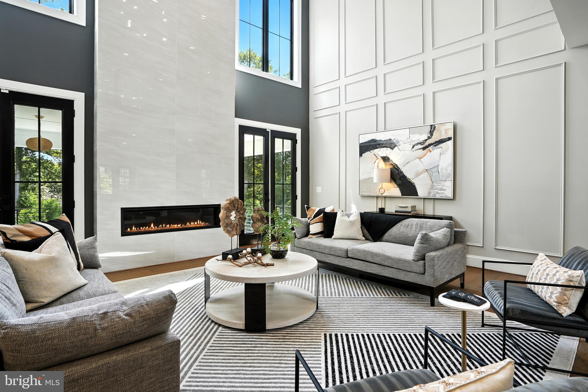 1321 Hunter Mill Road Vienna, VA 22182 - Photo 42 of 92 a living room with furniture and a window