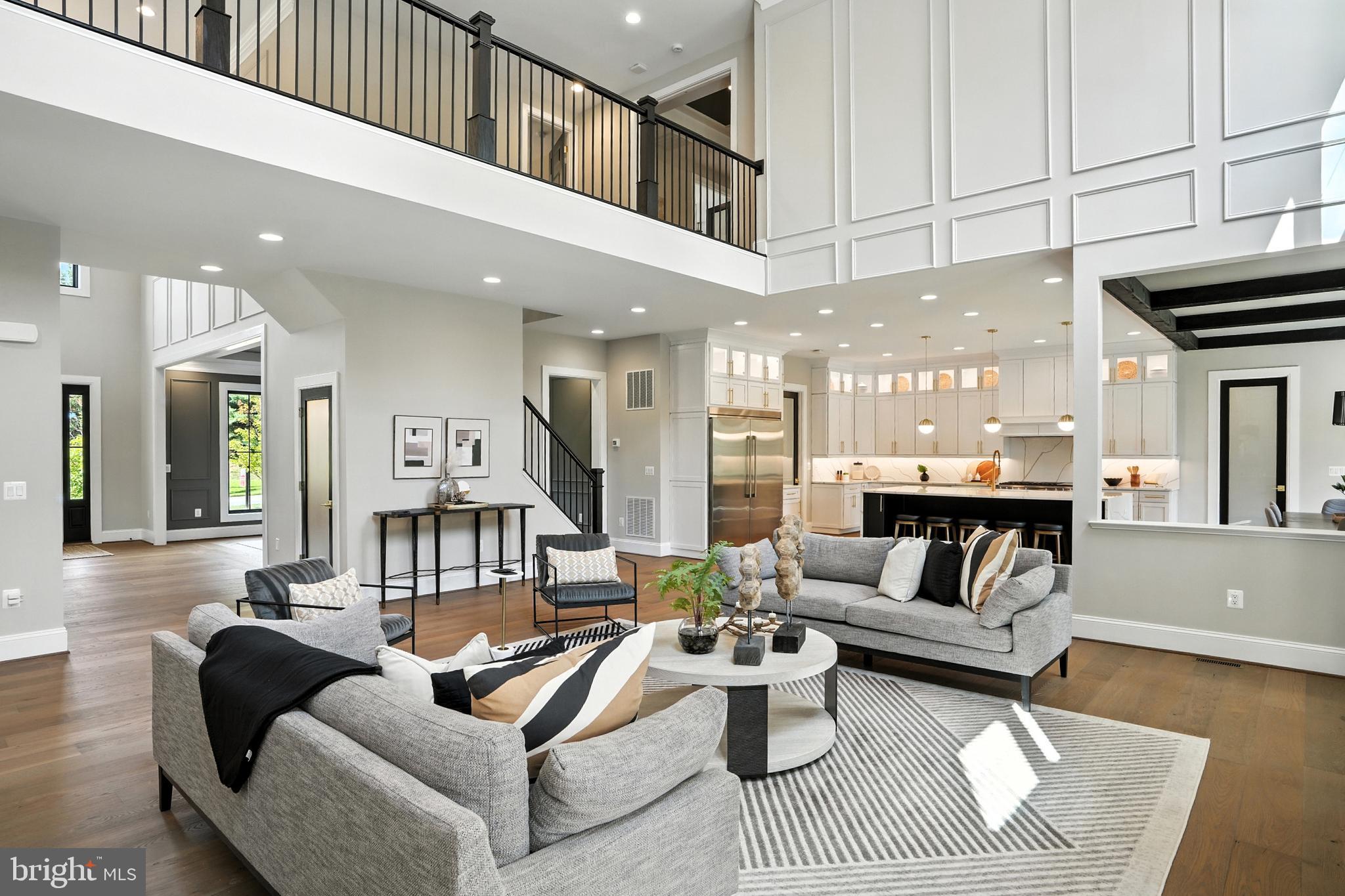 1321 Hunter Mill Road Vienna, VA 22182 - Photo 43 of 92 a living room with furniture a rug and white walls