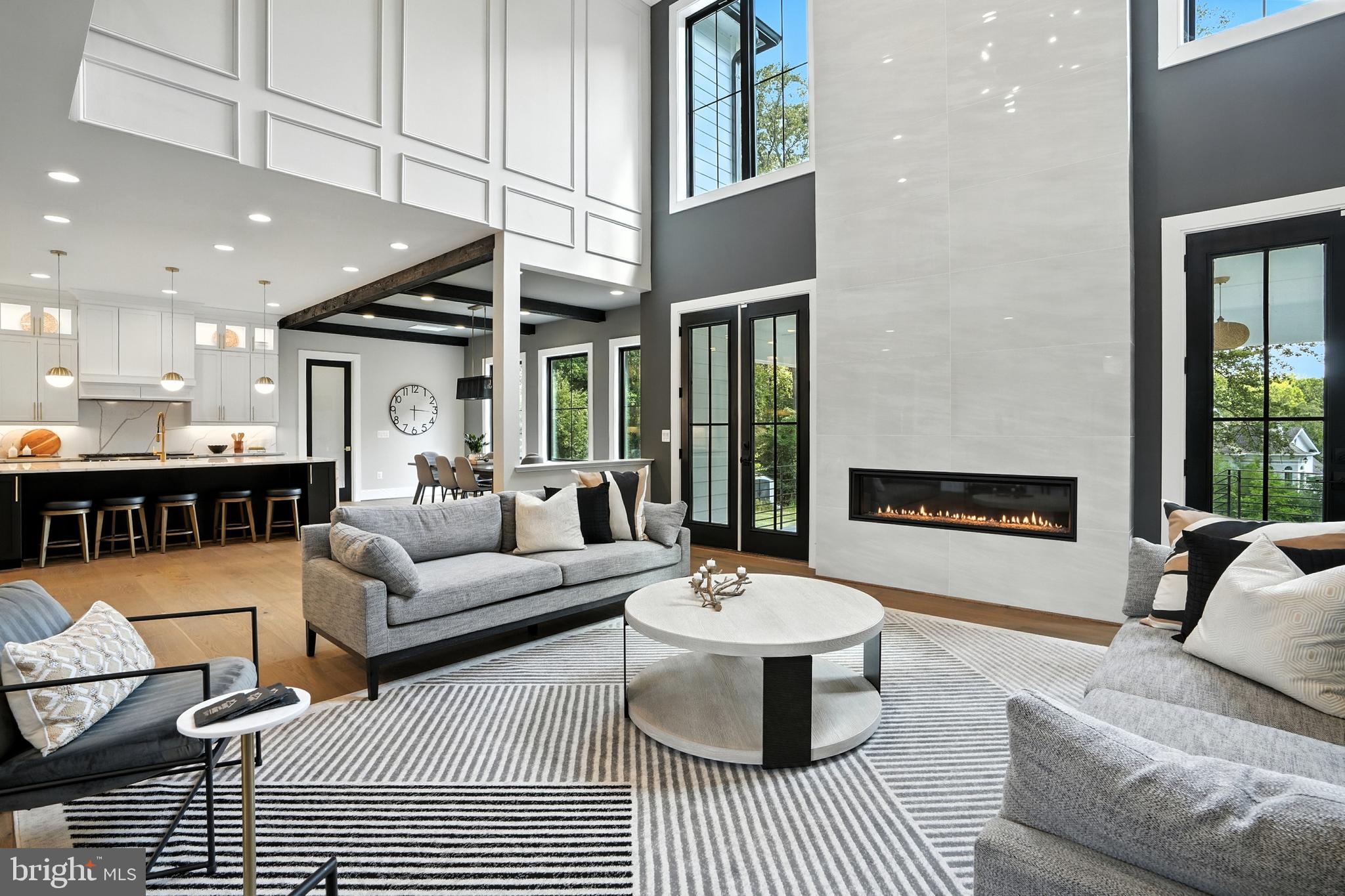 1321 Hunter Mill Road Vienna, VA 22182 - Photo 50 of 92 a living room with furniture and a table