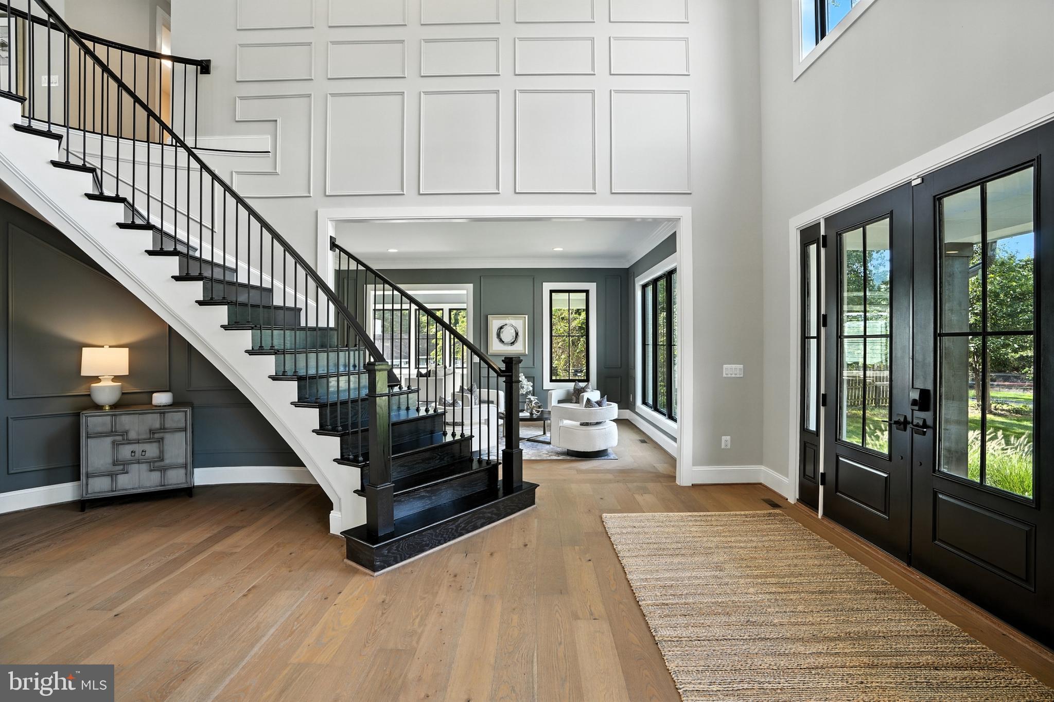 1321 Hunter Mill Road Vienna, VA 22182 - Photo 51 of 92 a view of entryway with wooden floor and stairs