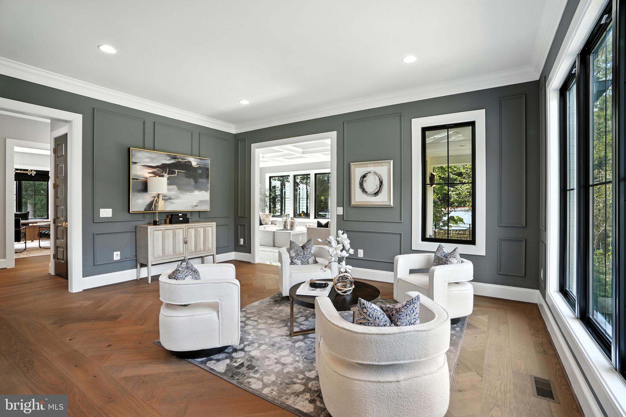 1321 Hunter Mill Road Vienna, VA 22182 - Photo 54 of 92 a living room with furniture and a large window