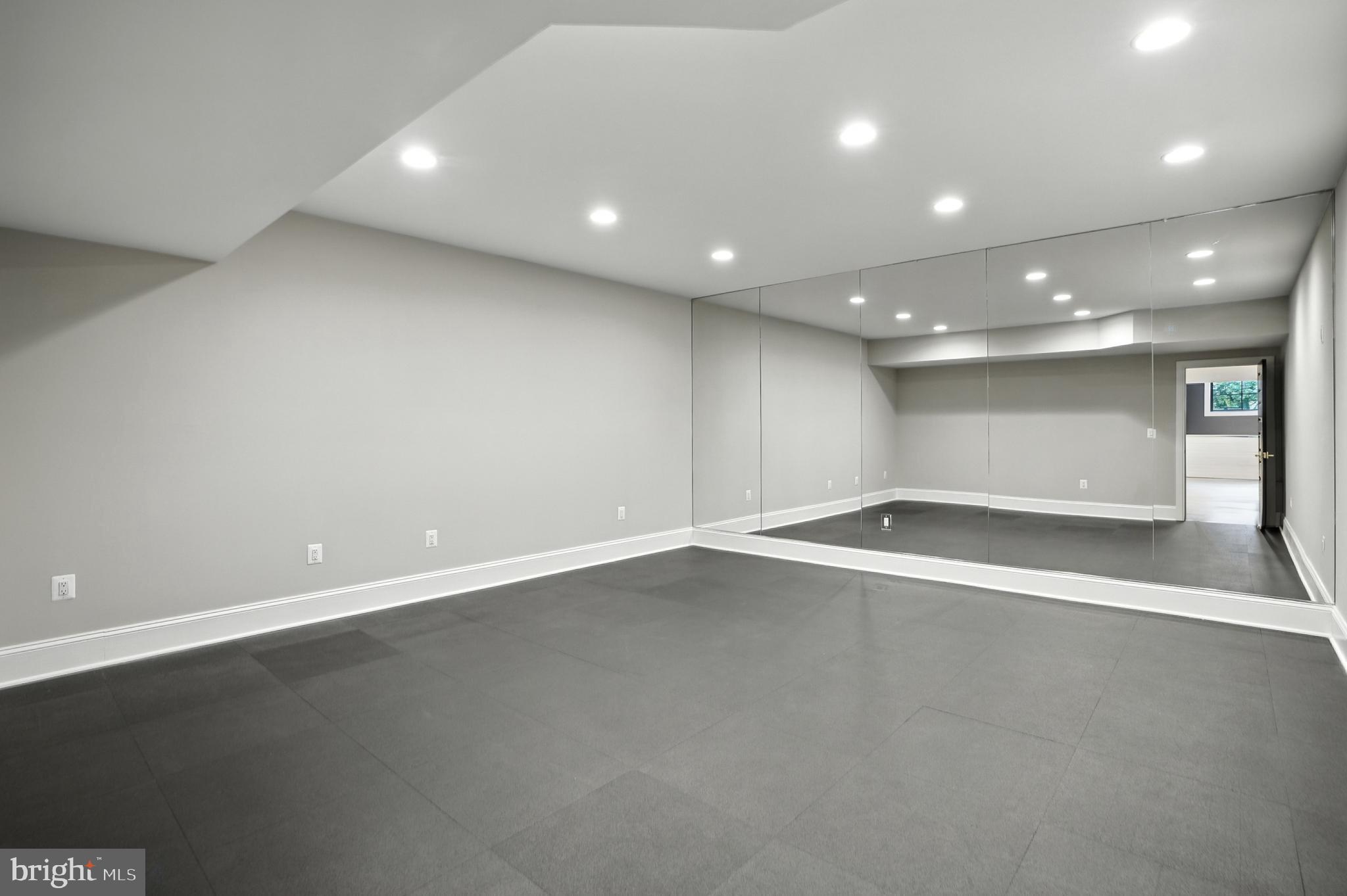 1321 Hunter Mill Road Vienna, VA 22182 - Photo 78 of 92 an empty room with a empty space and window