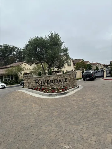 a view of street with parked cars
