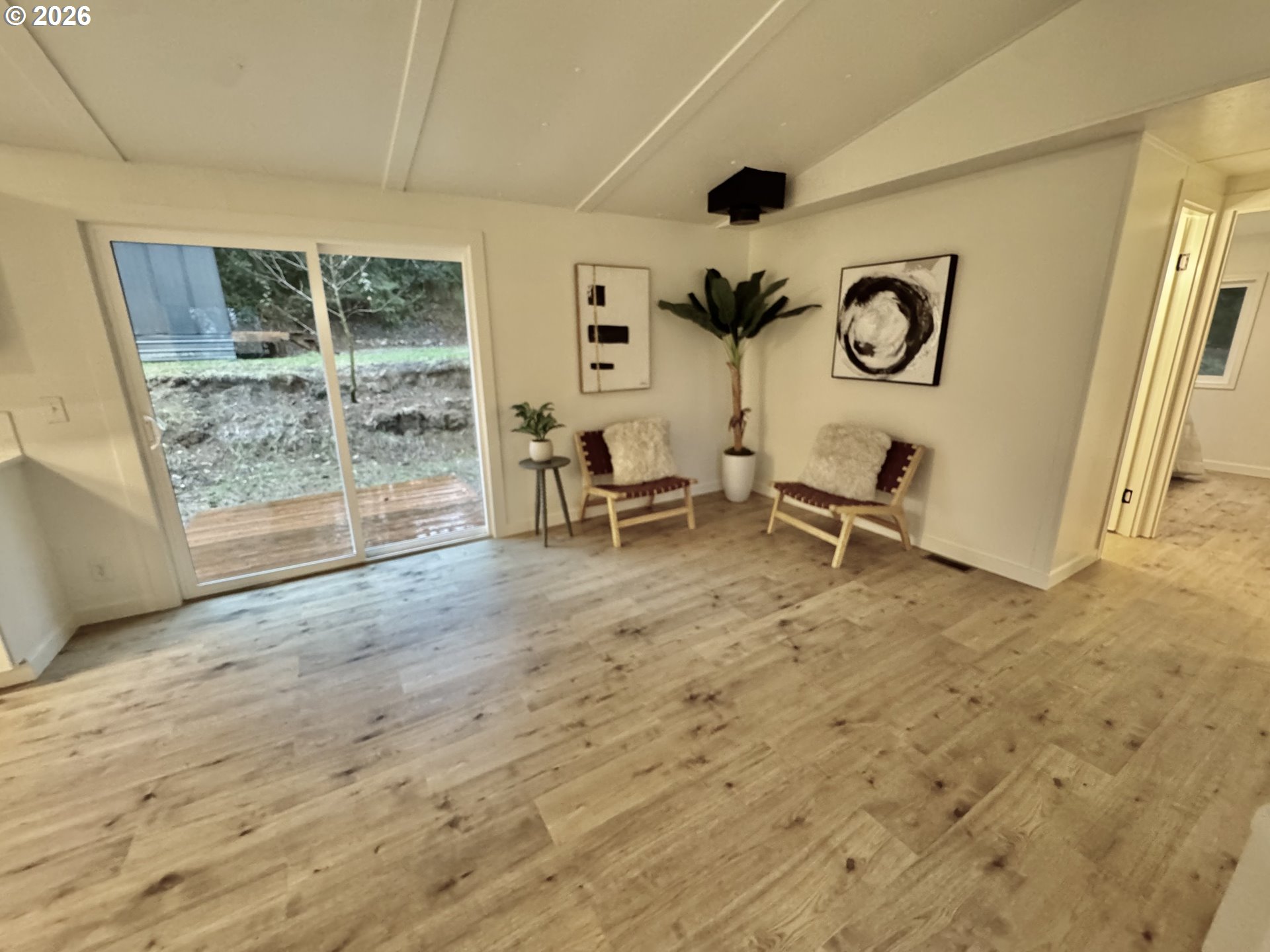 8138 Lewis River Road Ariel, WA 98603 - Photo 13 of 24 a living room with furniture and a large window