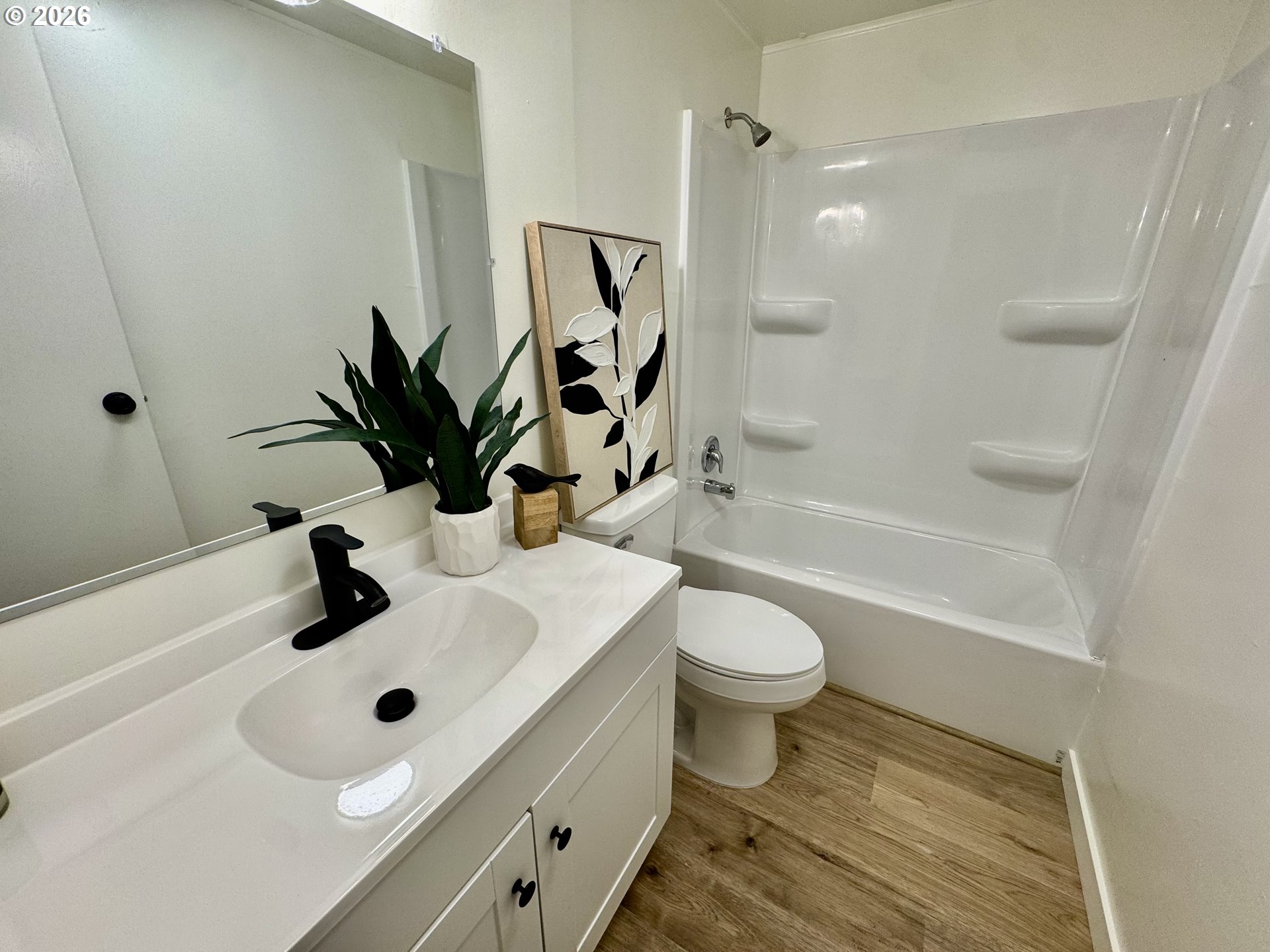 8138 Lewis River Road Ariel, WA 98603 - Photo 24 of 24 a bathroom with a sink a toilet and shower