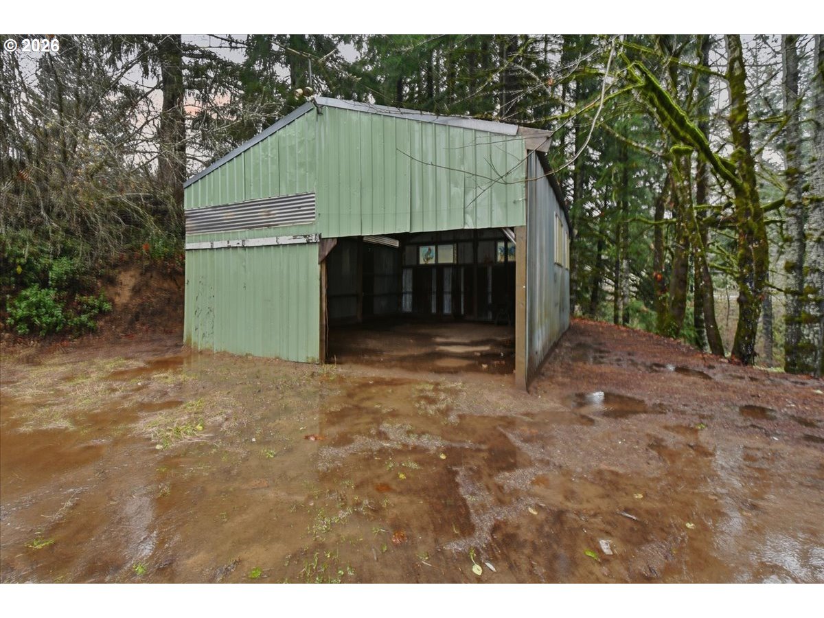 8138 Lewis River Road Ariel, WA 98603 - Photo 7 of 24 a small house with a outdoor space