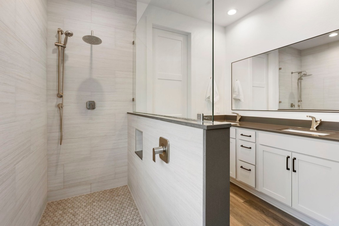 13757 Rising Sun Lane Conroe, TX 77384 - Photo 18 of 39 a bathroom with a shower and a sink