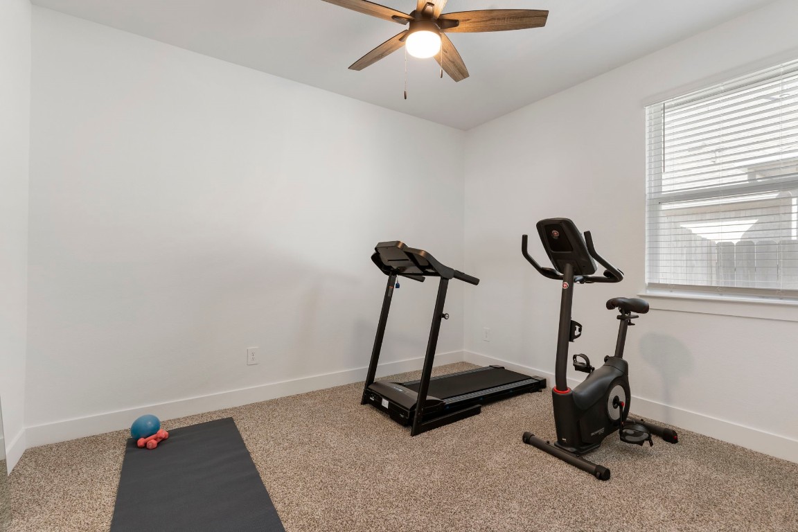 13757 Rising Sun Lane Conroe, TX 77384 - Photo 23 of 39 a view of a room with gym equipment