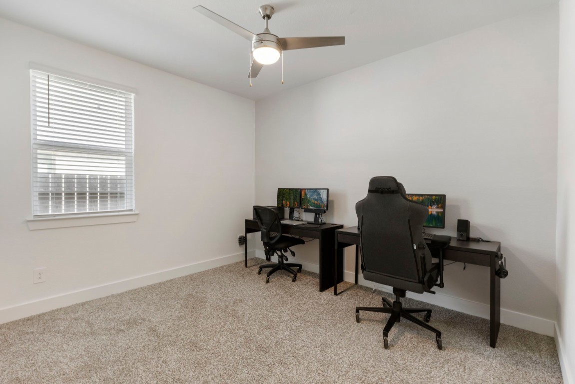 13757 Rising Sun Lane Conroe, TX 77384 - Photo 24 of 39 a view of a workspace with a window
