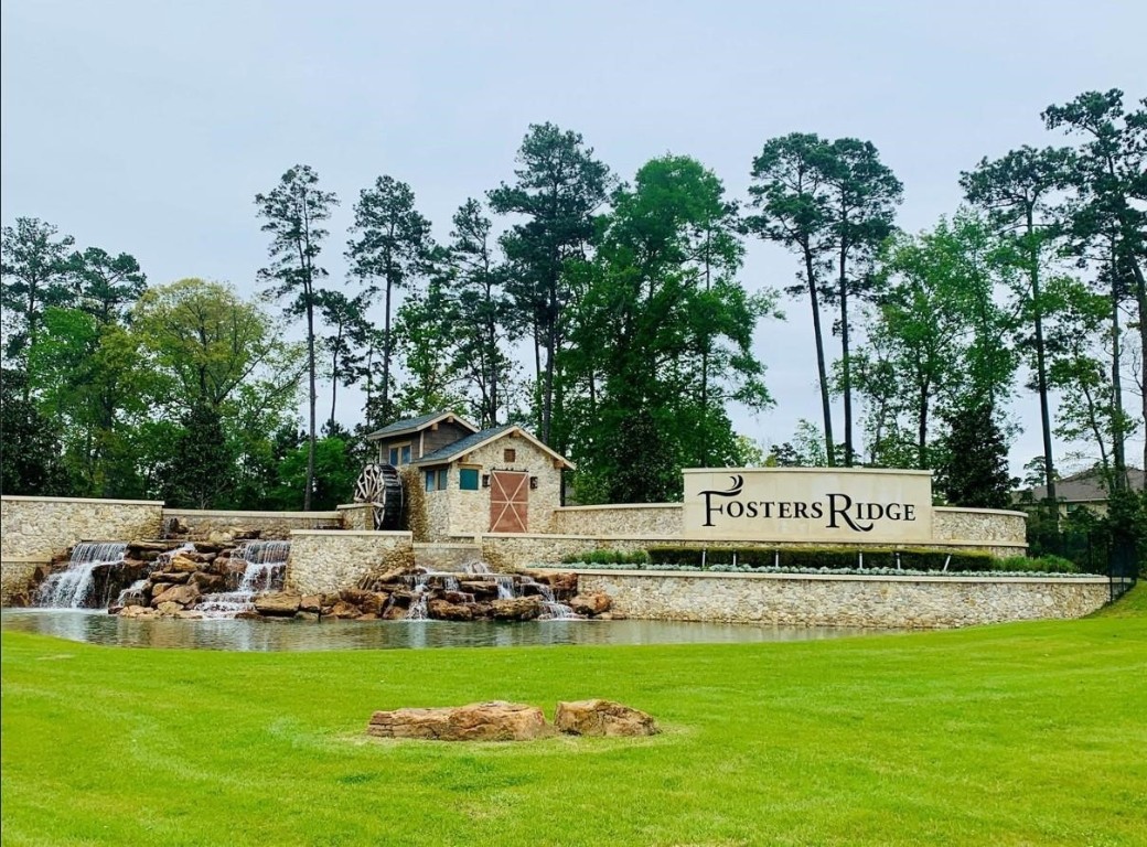 13757 Rising Sun Lane Conroe, TX 77384 - Photo 36 of 39 a view of an house with a garden and trees