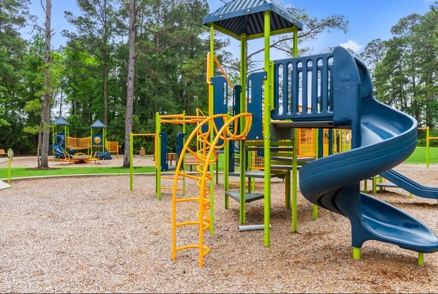 13757 Rising Sun Lane Conroe, TX 77384 - Photo 37 of 39 a view of a park with slide