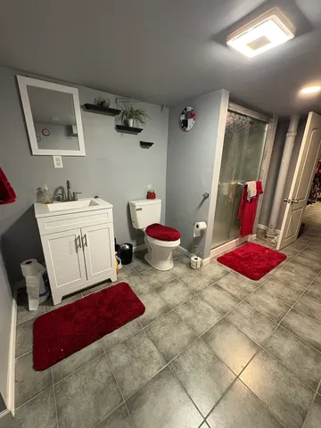 a bedroom with a bed and furniture