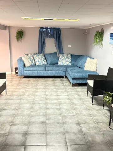 a living room with furniture and a couch