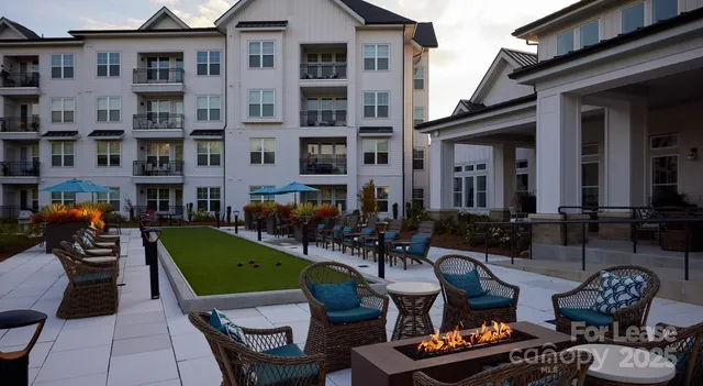 a view of balcony with wooden floor