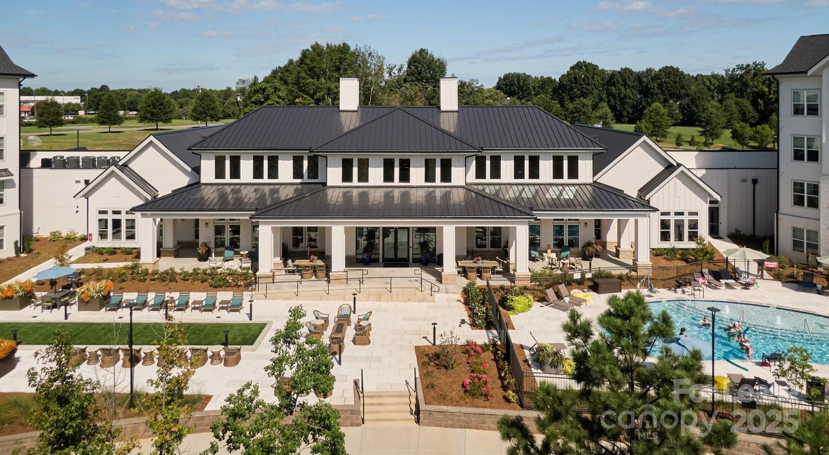 4101 Glenloch Circle, Unit A2 Matthews, NC 28105 - Photo 2 of 28 a front view of a residential houses with yard