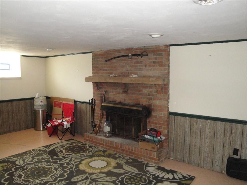 122 Cooper Road Finleyville, PA 15332 - Photo 12 of 25 Lower level Family room with wood burning fireplace...